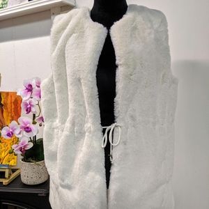 Faux Fur: 100% Polyester Vest